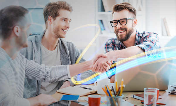 business executive shaking hands with the customer after sealing a deal