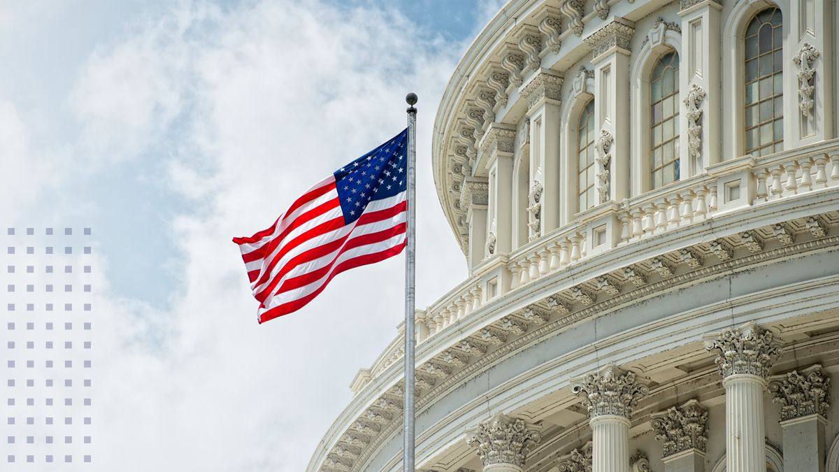 Washington DC Capitol dome detail with waving american flag