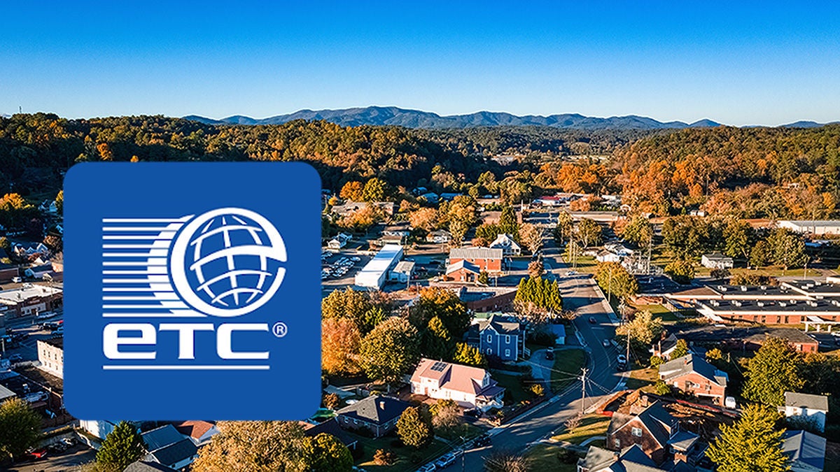 etc logo over hilly landscape