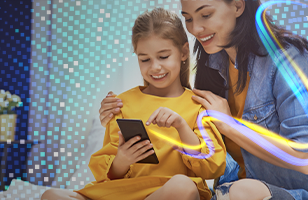 mother and daughter playing game on tablet