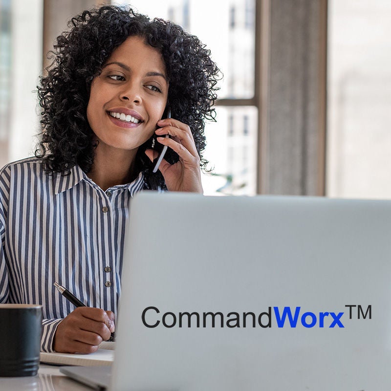 Female office worker on laptop and CommandWorx logo