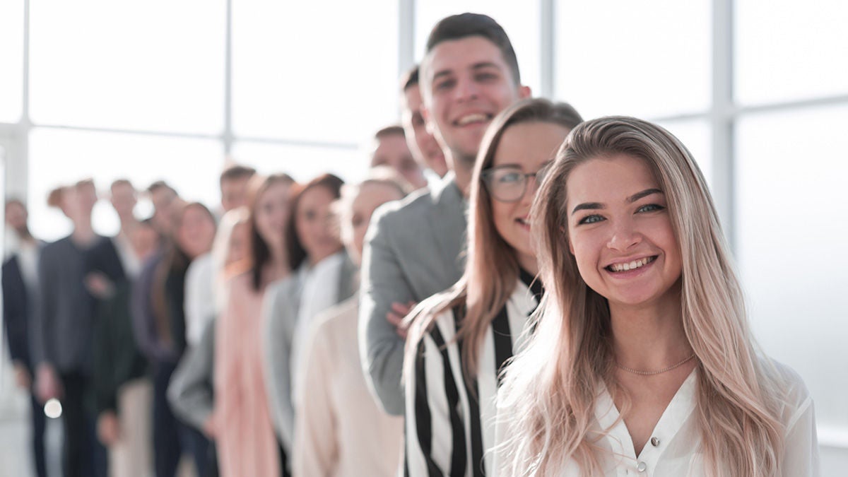 smiling people lined up