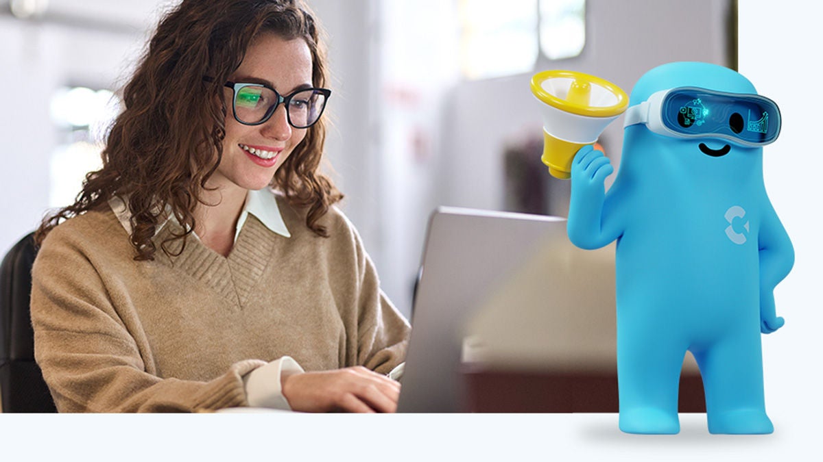 Smiling marketer on laptob with animated AI agent next to her