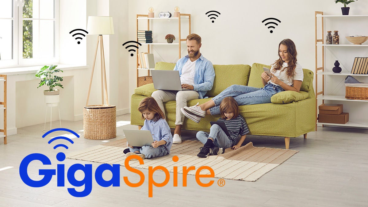 Family with devices and GigaSpire logo