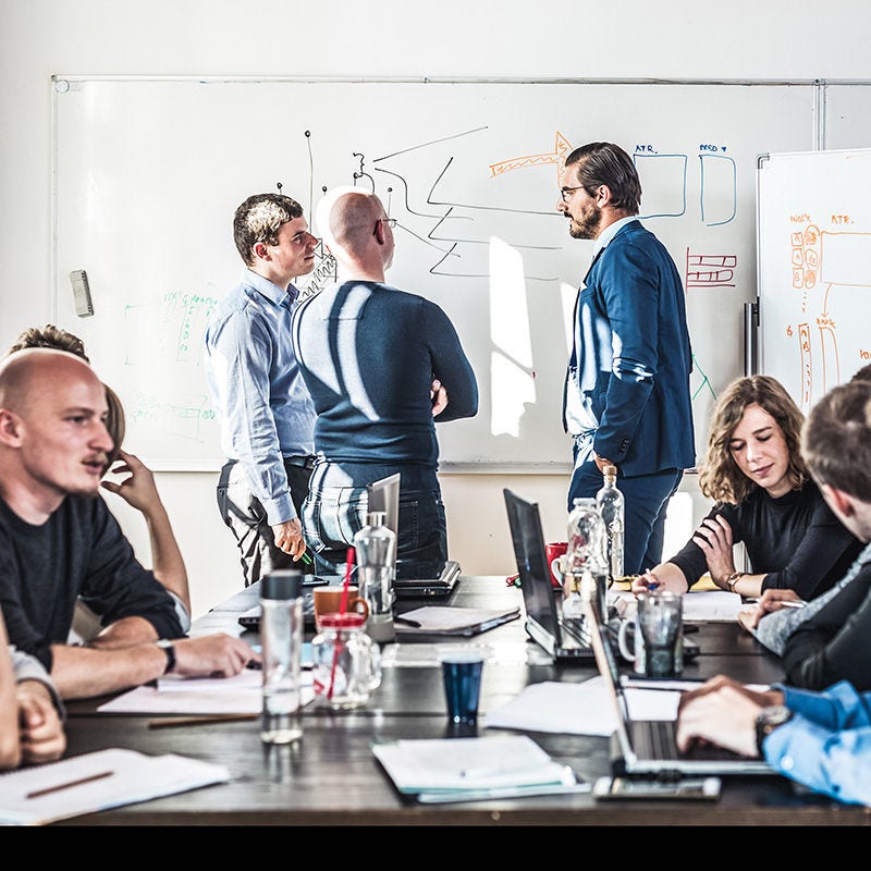 attendees working in meeting