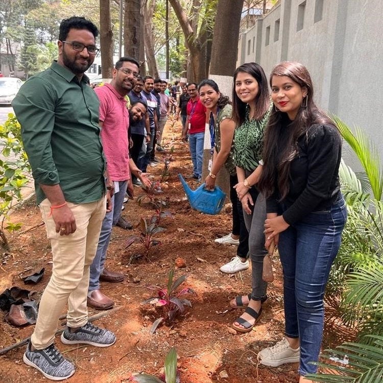 employees volunteering on earth day